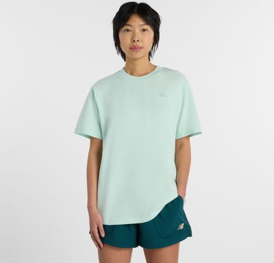 New Balance - Bluzka damska bez wzorów w sportowym stylu ze sklepu: New Balance Poland w kategorii: Bluzki damskie - zdjęcie 08F3FC-30B-10813_3216666