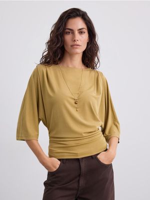 Bluzka damska wiosenna Mohito ze sklepu: Mohito w kategorii: Bluzki damskie - zdjęcie 55A556F-010-6967_266KU