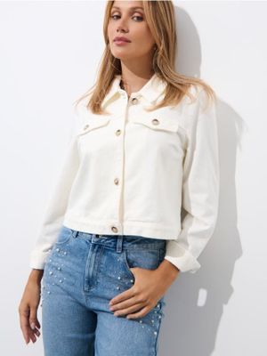 Jeansy damskie eleganckie Mohito ze sklepu: Mohito w kategorii: Jeansy damskie - zdjęcie 55A556F-010-6967_433CZ