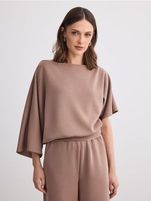 Bluzka damska elegancka Mohito ze sklepu: Mohito w kategorii: Bluzki damskie - zdjęcie 55A556F-010-6967_470KT