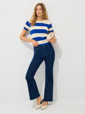 Jeansy damskie w miejskim stylu Mohito ze sklepu: Mohito w kategorii: Jeansy damskie - zdjęcie 55A556F-010-6967_783JQ
