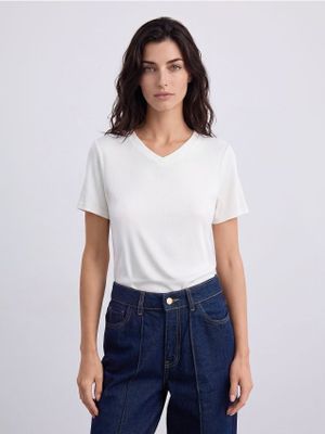 Bluzka damska Mohito ze sklepu: Mohito w kategorii: Bluzki damskie - zdjęcie 55A556F-010-6967_888LD
