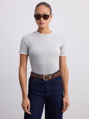 Mohito - Bluzka damska na wiosnę ze sklepu: Mohito w kategorii: Bluzki damskie - zdjęcie 55A556F-010-6967_986LD