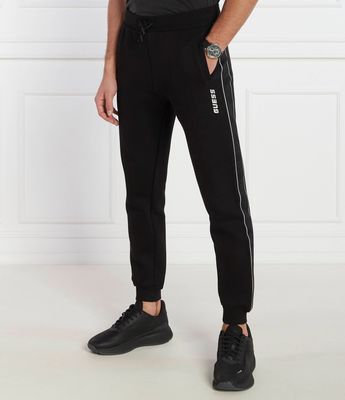 GUESS ACTIVE - Spodnie męskie na wiosnę ze sklepu: Gomez Fashion Store w kategorii: Spodnie męskie - zdjęcie 874714-BD9-10338_GV241M000001046