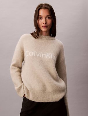 Sweter damski bez wzorów Calvin Klein ze sklepu: Gomez Fashion Store w kategorii: Swetry damskie - zdjęcie 874714-BD9-10338_CK255W000166E13