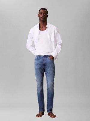 Jeansy męskie klasyczny Calvin Klein Jeans ze sklepu: Gomez Fashion Store w kategorii: Jeansy męskie - zdjęcie 874714-BD9-10338_CJ261M000027Z27