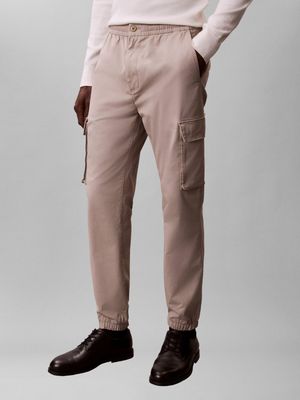 Calvin Klein Jeans - Spodnie męskie wiosenne na lato ze sklepu: Gomez Fashion Store w kategorii: Spodnie męskie - zdjęcie 874714-BD9-10338_CJ262M000025W75