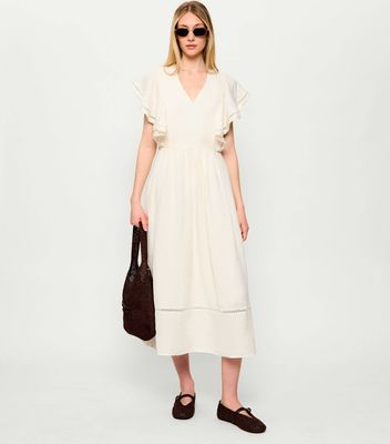 Sukienka na wiosnę Tommy Hilfiger ze sklepu: Gomez Fashion Store w kategorii: Sukienki - zdjęcie 874714-BD9-10338_TH262W000219Z21