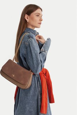 Kopertówka elegancka Calvin Klein ze sklepu: eobuwie.pl w kategorii: Kopertówki - zdjęcie WP-EBWP-9KUZS-09B_8721224843823