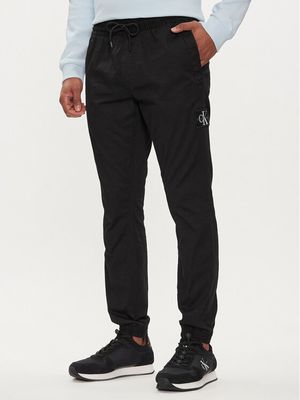 Spodnie męskie w sportowym stylu Calvin Klein Jeans ze sklepu: MODIVO w kategorii: Spodnie męskie - zdjęcie WP-EBWP-BKLVO-LN0_0000303410391