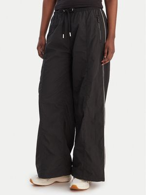Spodnie damskie na lato Tommy Jeans ze sklepu: MODIVO w kategorii: Spodnie damskie - zdjęcie WP-EBWP-BKLVO-LN0_0000305758392