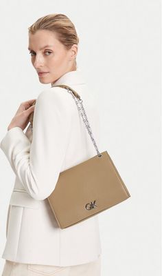 Kopertówka elegancka Calvin Klein ze sklepu: MODIVO w kategorii: Kopertówki - zdjęcie WP-EBWP-BKLVO-LN0_8719849128944