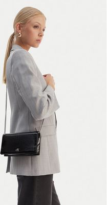 Kopertówka elegancka Calvin Klein ze sklepu: MODIVO w kategorii: Kopertówki - zdjęcie WP-EBWP-BKLVO-LN0_8721224841836